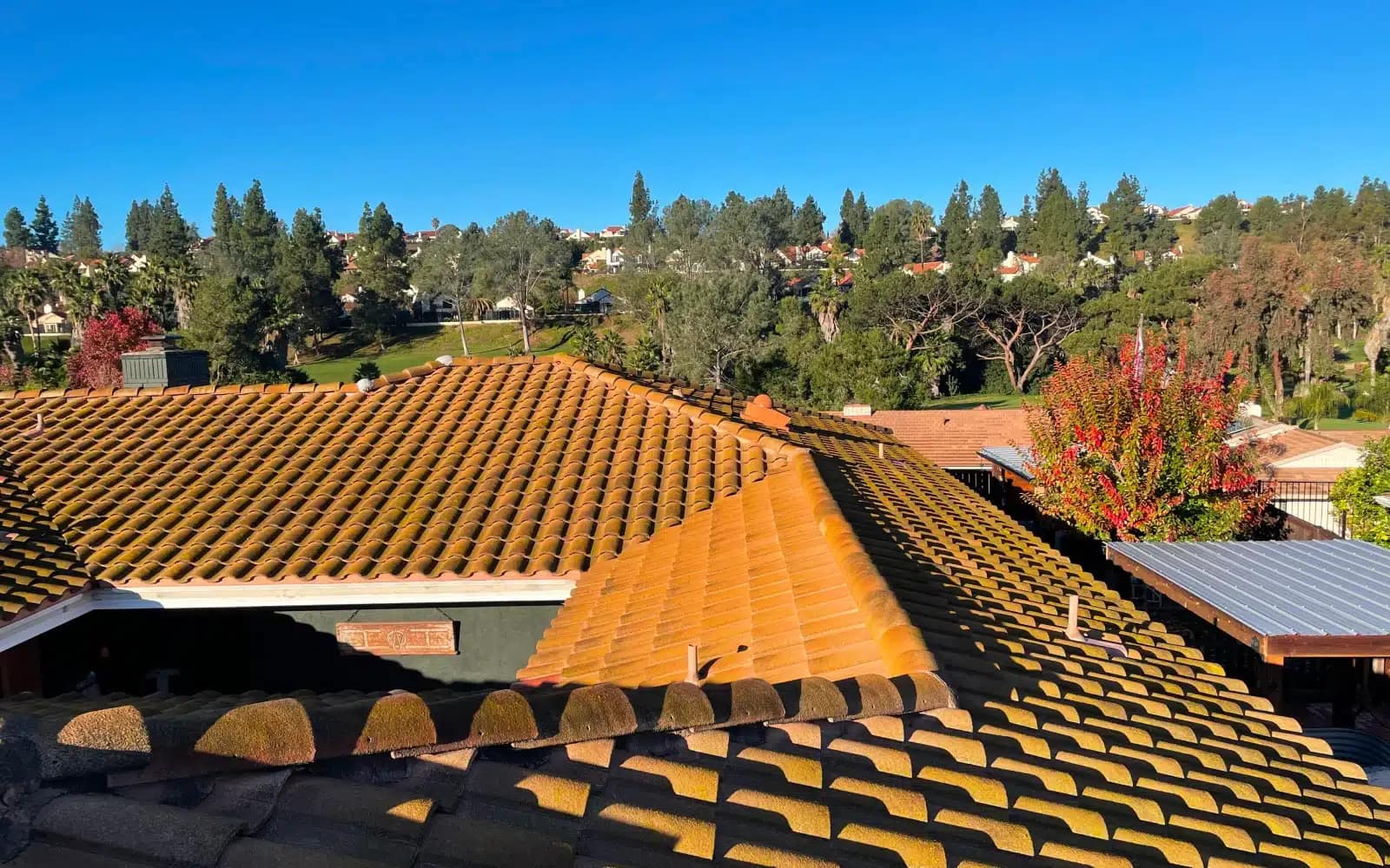 concrete-tile-roof-before-solar-removal-rancho-bernardo-ca Concrete tile roof in Rancho Bernardo, CA showing existing tile roofing prior to coordinated roof replacement with solar panel removal.