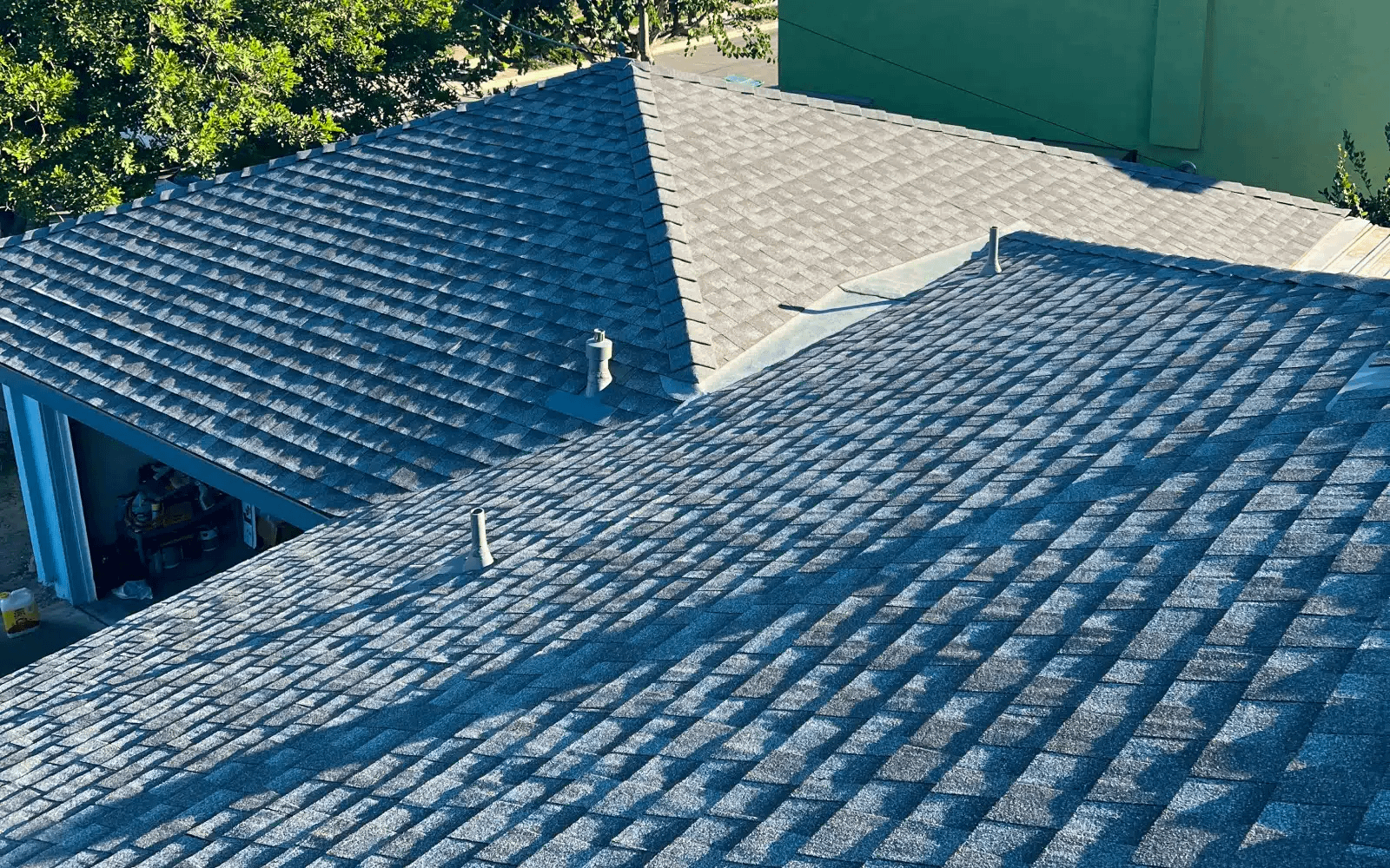 Completed cool roof replacement in San Carlos, San Diego, CA showing Title 24 compliant asphalt shingle installation