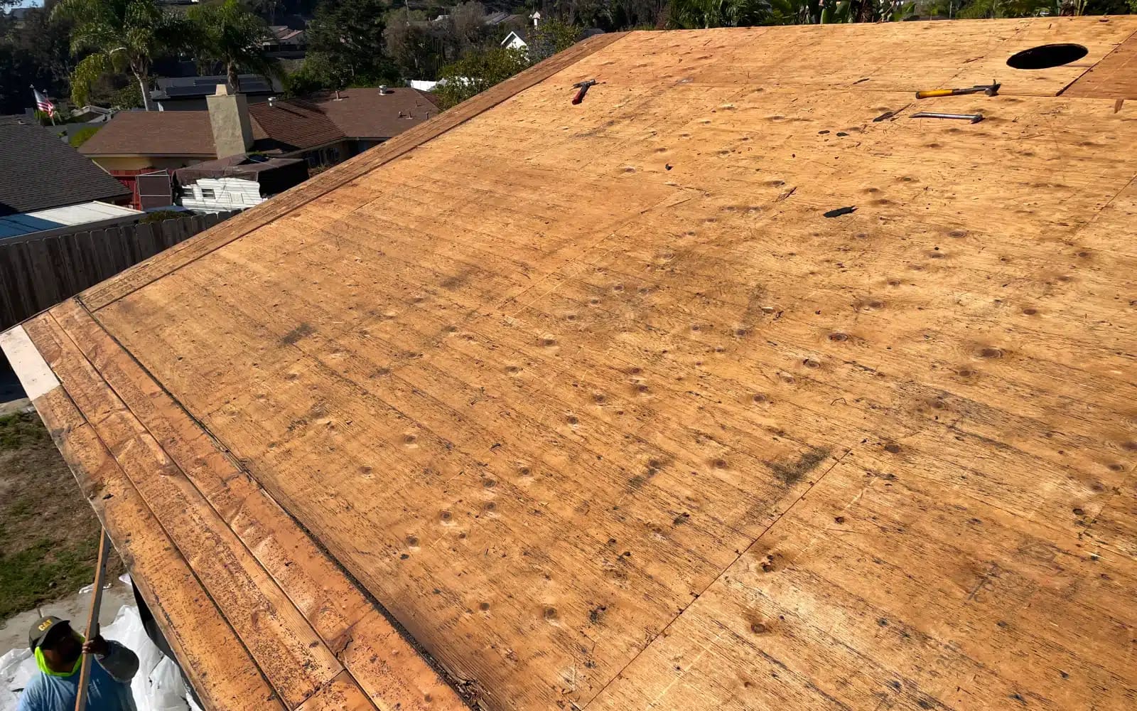 Roof deck exposed during roof replacement with solar panels in Rancho Peñasquitos, CA
