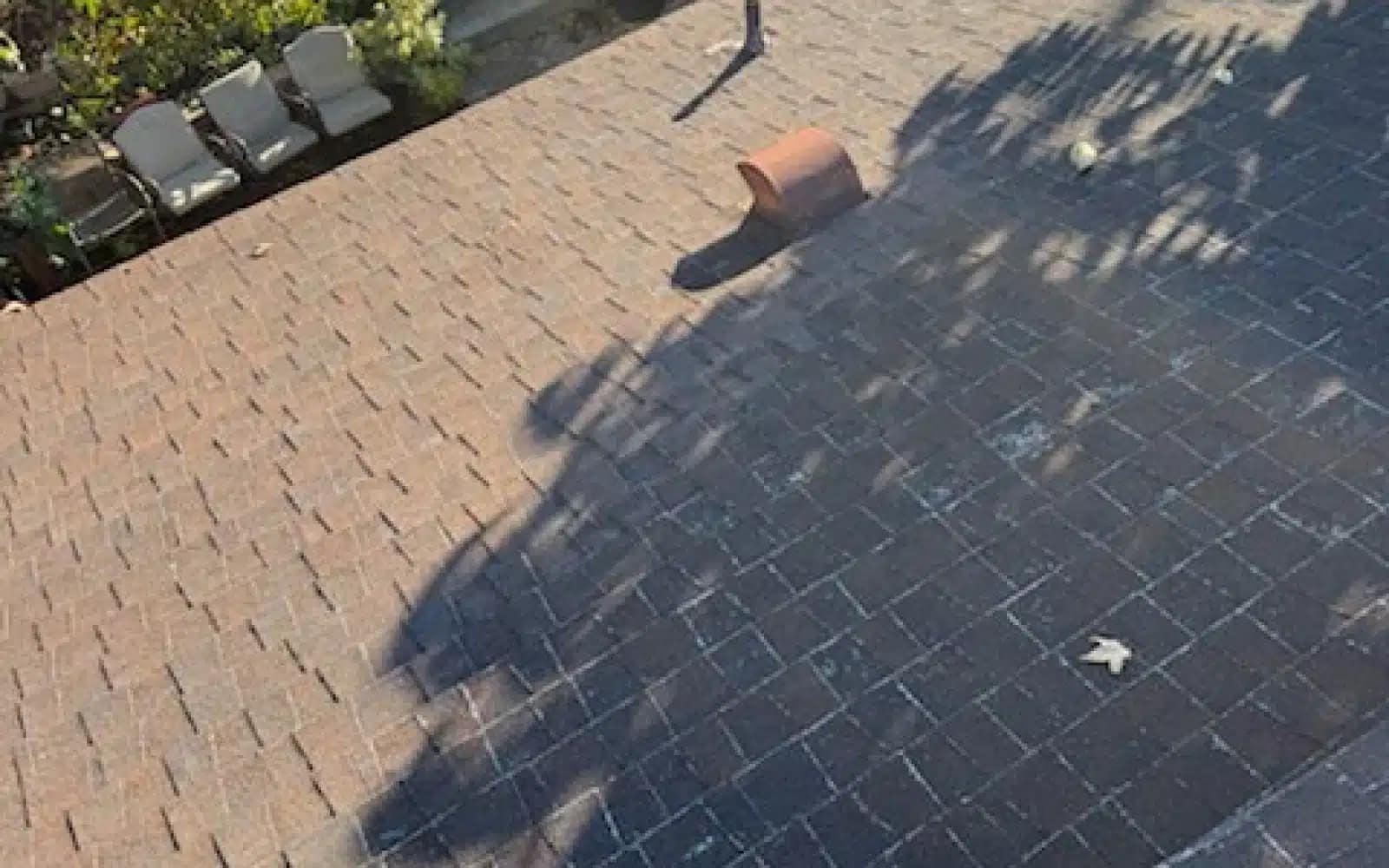 Worn asphalt shingle roofing showing surface wear before a full roof replacement in La Mesa, CA.