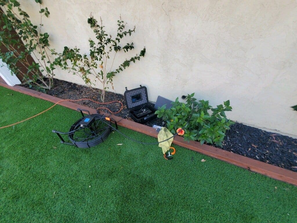 Garden sewer camera equipment near a wall Garden sewer camera equipment near a wall