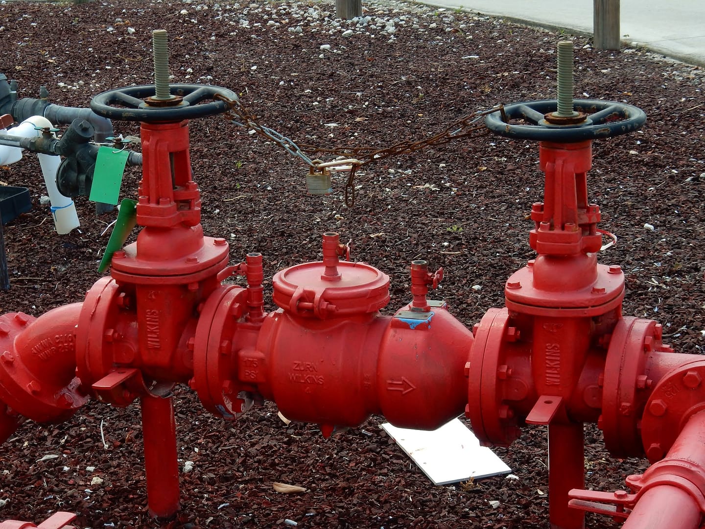 Red industrial water valves and pipes Red industrial water valves and pipes