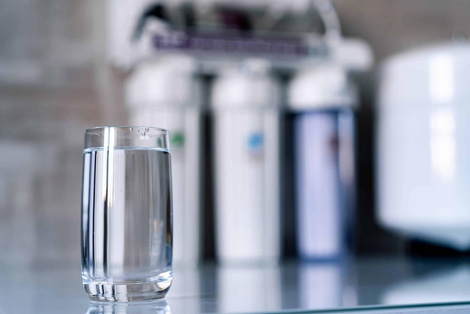 Clear glass of water on table Clear glass of water on table