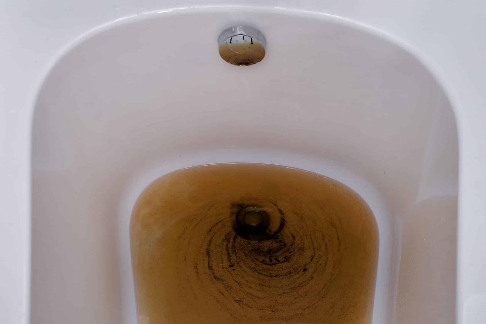 Drain Cleaning Services Moore Plumbing and Drains Dirty bathtub with brown water due to drain backup