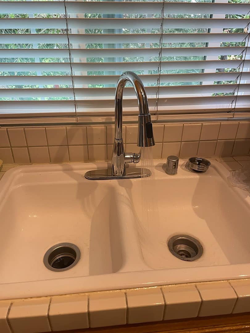 Kitchen sink with running water. Kitchen sink with running water.